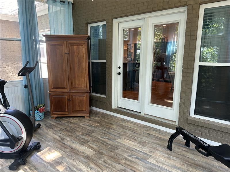 French doors from sunroom to kitchen