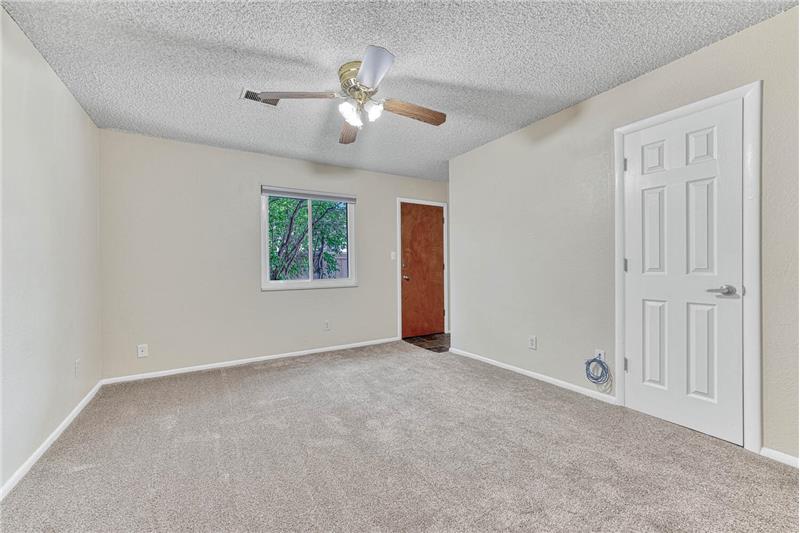 Lower level family room provides a walk-out to the private backyard/patio