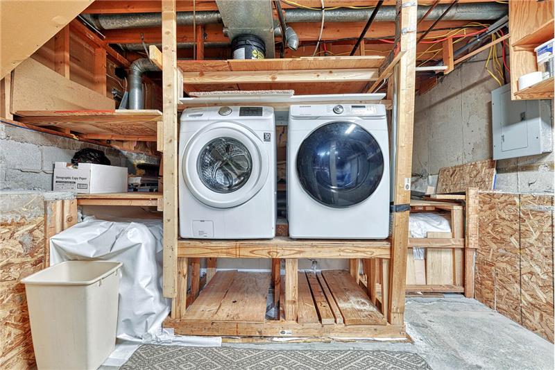 Laundry area in basement. New subpanel also added.