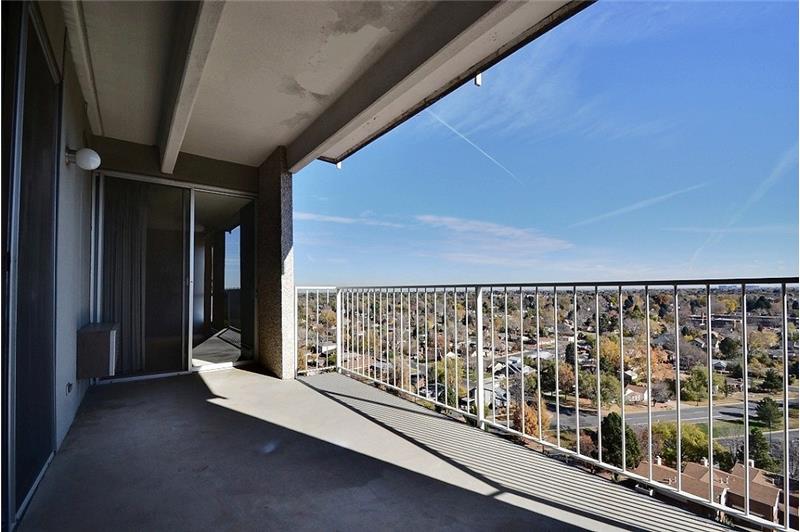 Large balcony overlooking east Denver 