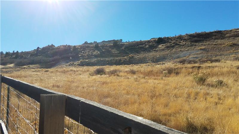 Meadow and Hogback Behind Property To Southwest