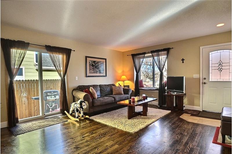 Family Room/Greatroom - Anderson Windows, Hardwood Floors, Tiled Entry, Slider to Side Patio