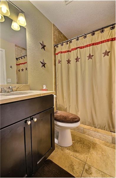 Master Bathroom with Tiled Shower, High Quality Fixtures and Walk-in Closet