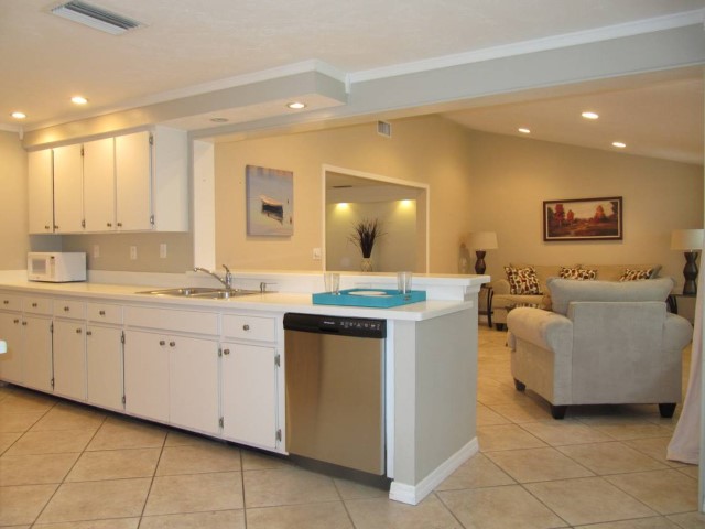 Kitchen opens to Family Room
