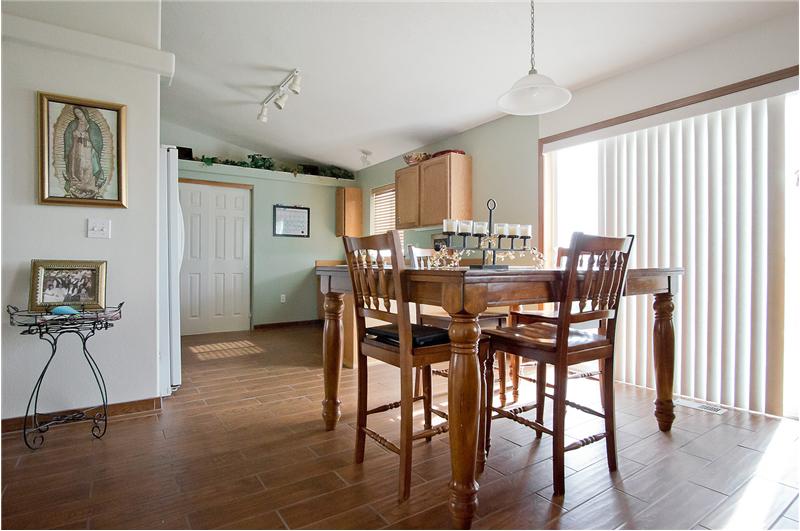 Kitchen opens nicely to the dining area and leads to the back patio.