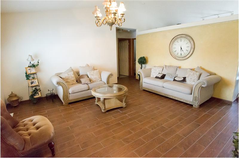 The main living space greets you with gorgeous tile flooring.
