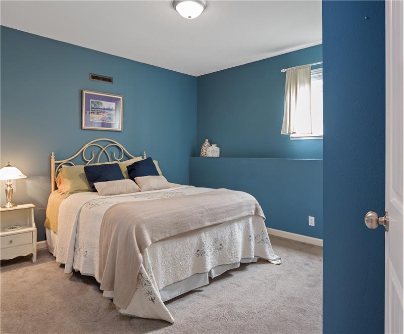 This fourth bedroom on the Lower level adjacent to the 3/4 bath provides private accommodations for your guests