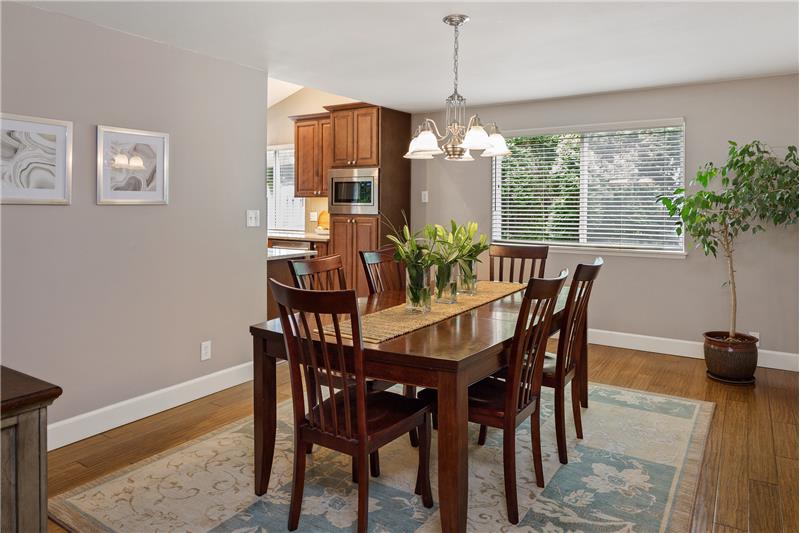 Dining room easily accommodates a large 2-leaf, 10 person table (pictured here with only one leaf).