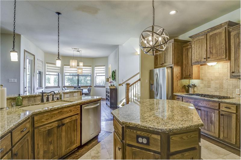 Large kitchen with tons of cabinets and counters