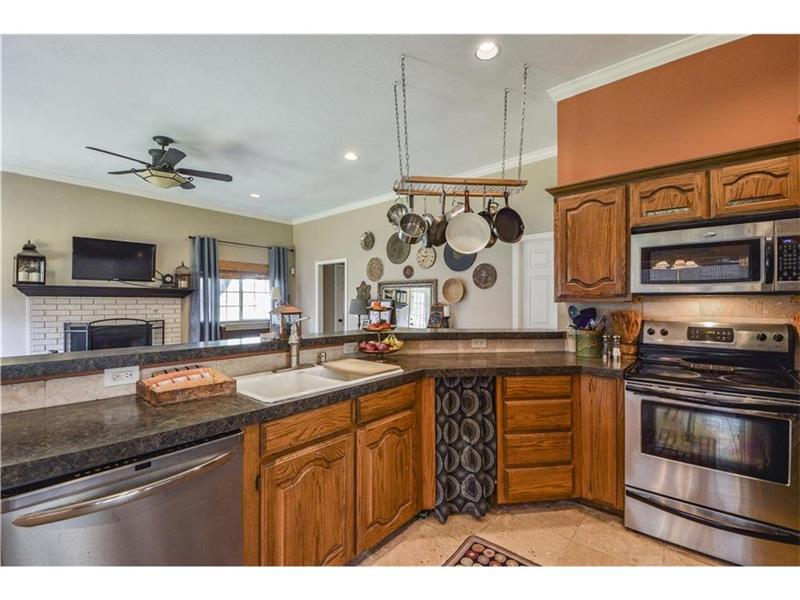 Spacious kitchen with stainless appliances