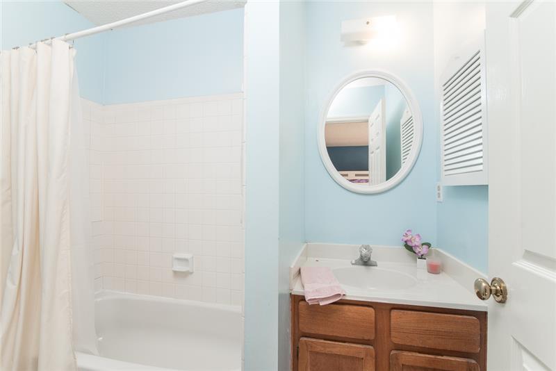A private full bathroom is attached to the second bedroom.