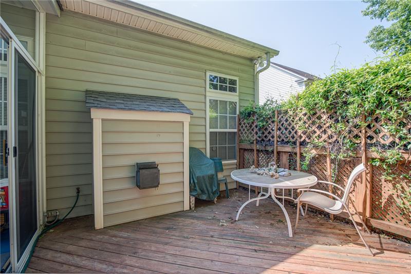 The sunny deck is the perfect place for a backyard barbecue.