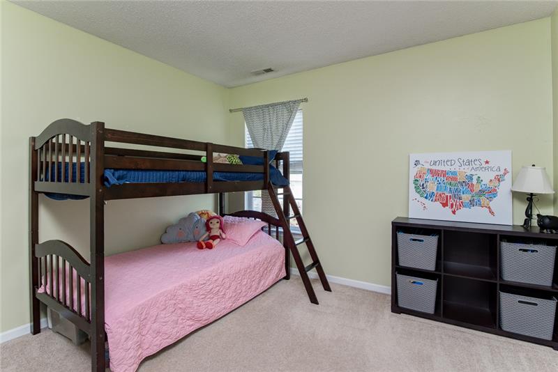 The secondary bedroom is spacious, clean and bright.