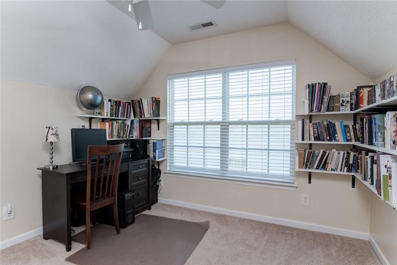 This area is perfect for a media room, playroom or office.