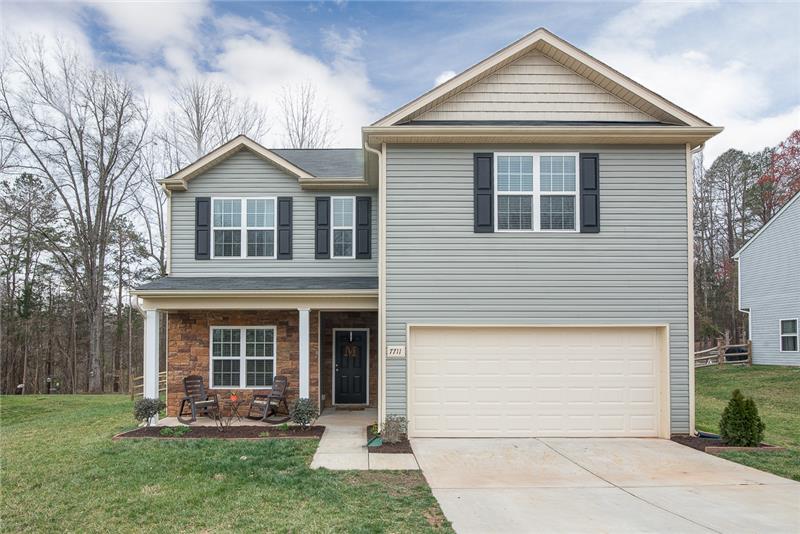 Welcome home to this immaculate two story home with stone accents and front porch.