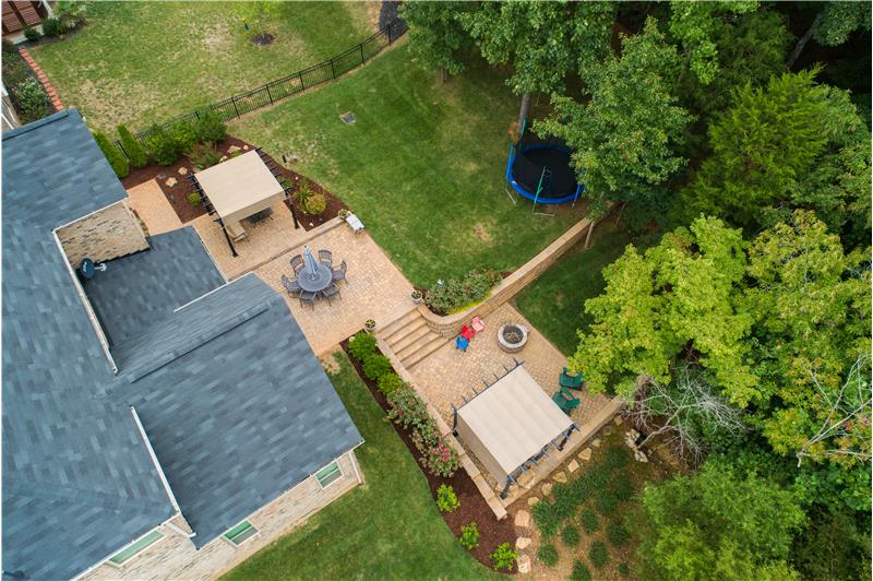 Check out just how large and exquisite this multi tiered patio area is!