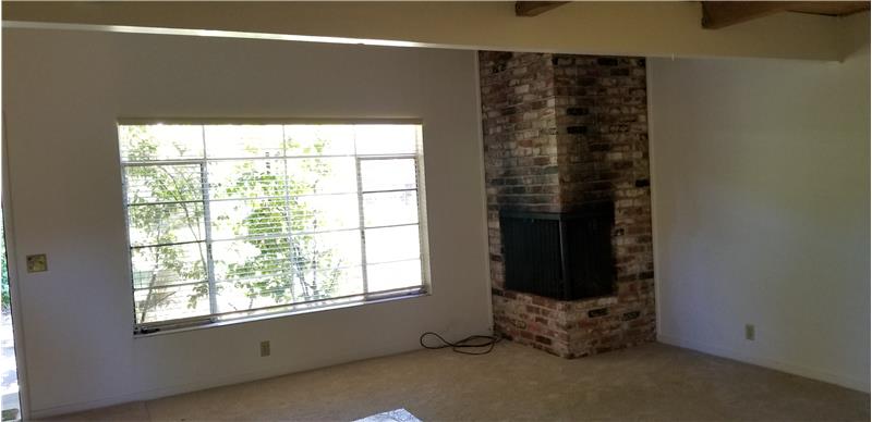 Fireplace and front window