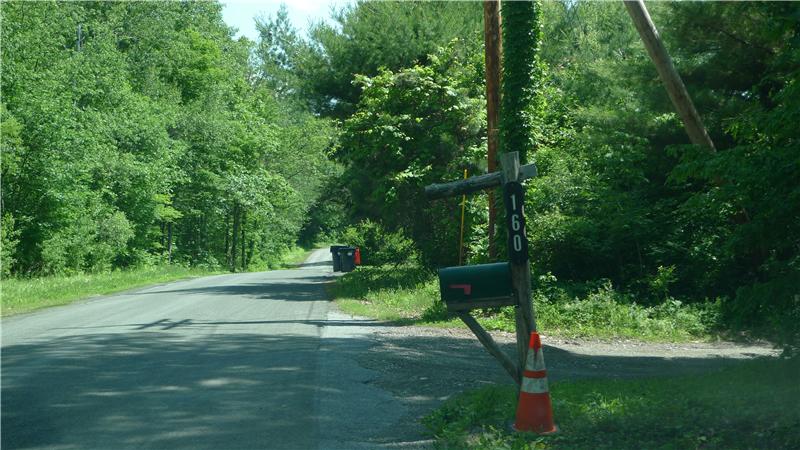 Lot to the left of sign 160