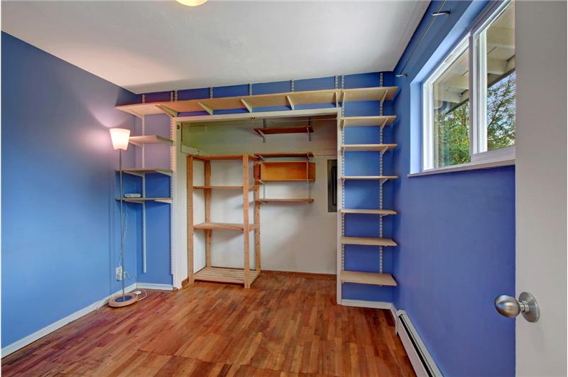Second bedroom. All shelving stays for your convenience.