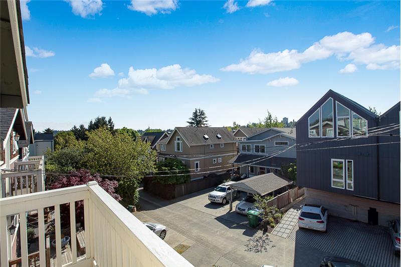 Upper level deck off master bed.  Peek A Boo views of city, great place to relax and enjoy the neighborhood.