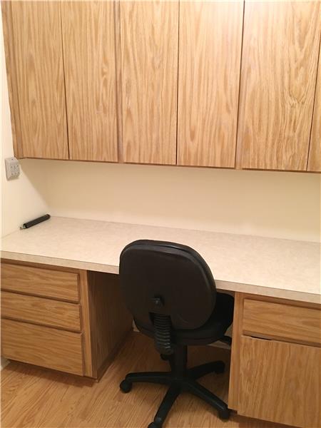 Desk and Cabinet in Laundry Room