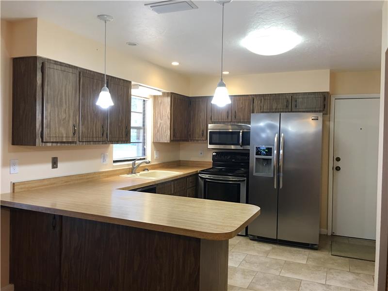 Kitchen Opens to Family Room
