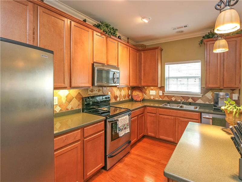Abundant cabinetry and workspace