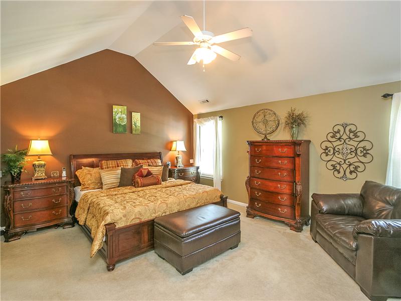 Spacious master suite with cathedral ceiling
