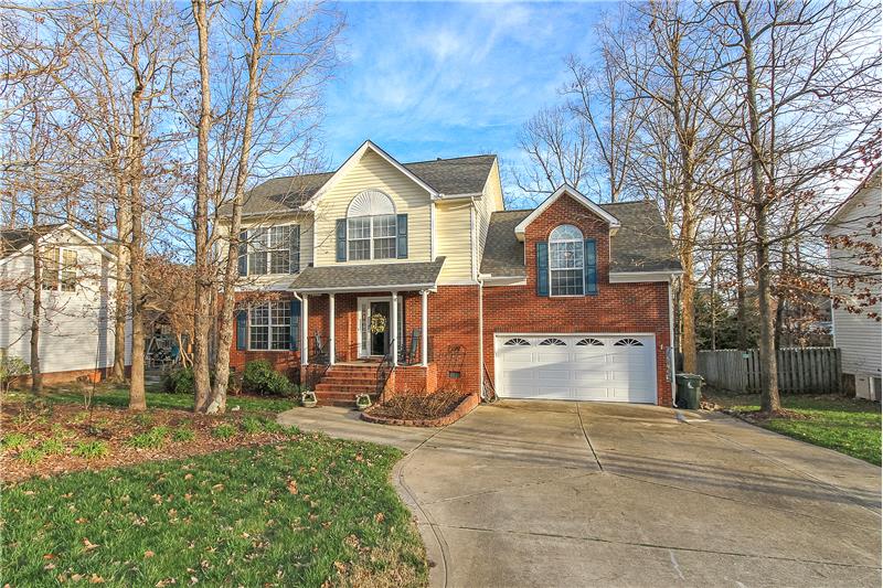 Beautifully updated two-story on wooded lot