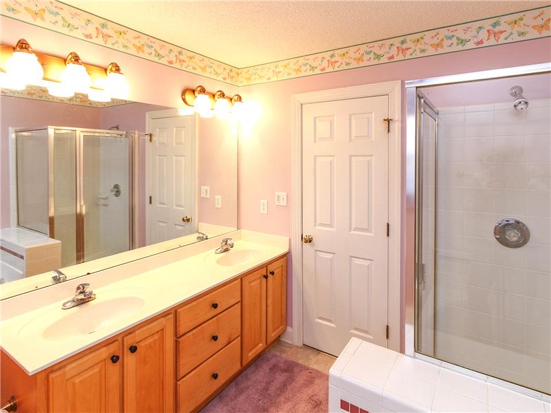 Master bath has garden tub and separate shower