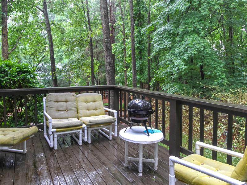 Deck overlooking private backyard