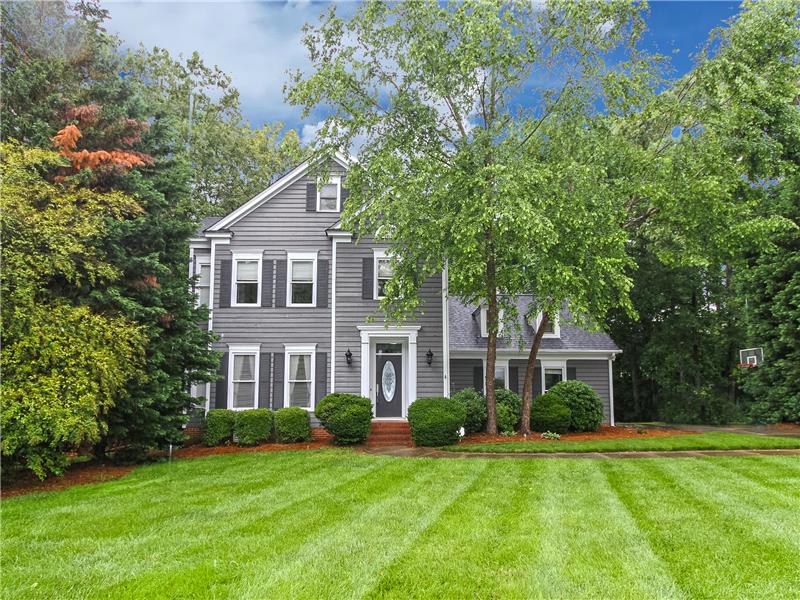 Handsome two-story in lush setting