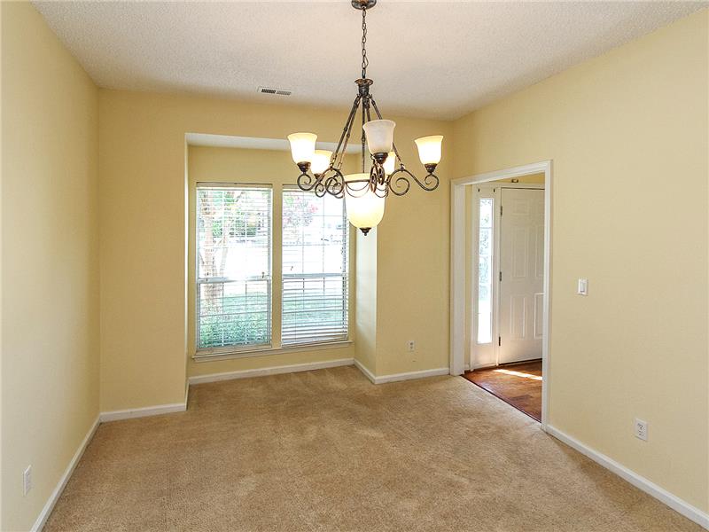 Formal dining with updated chandelier