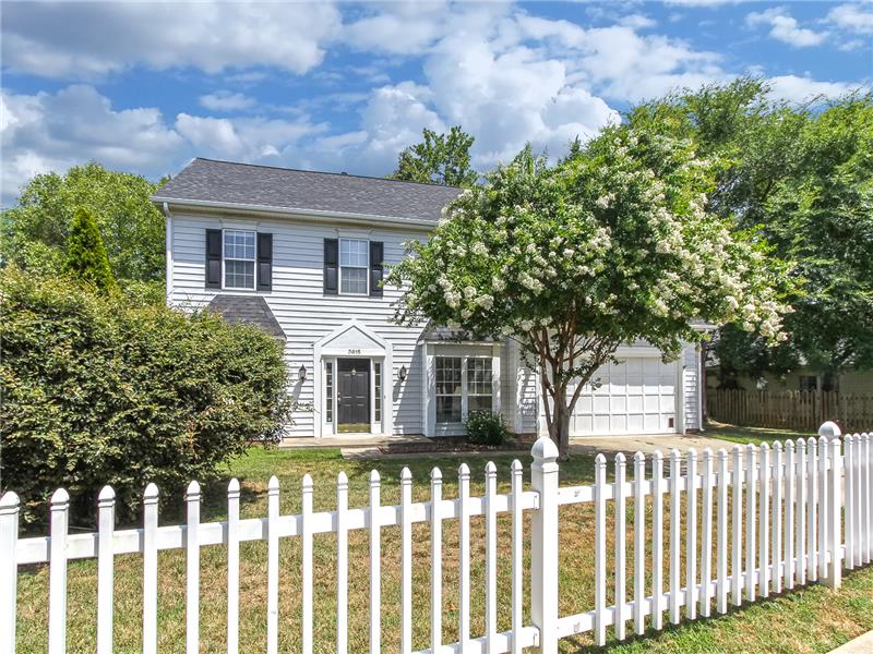 White picket fence welcomes you home