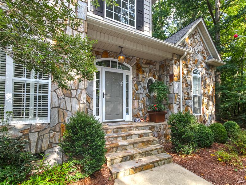 Beutiful stone and shingle accented exterior
