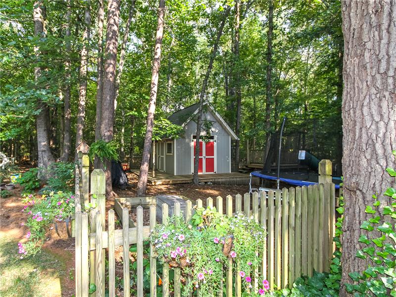 12'x16' shed with fenced play area