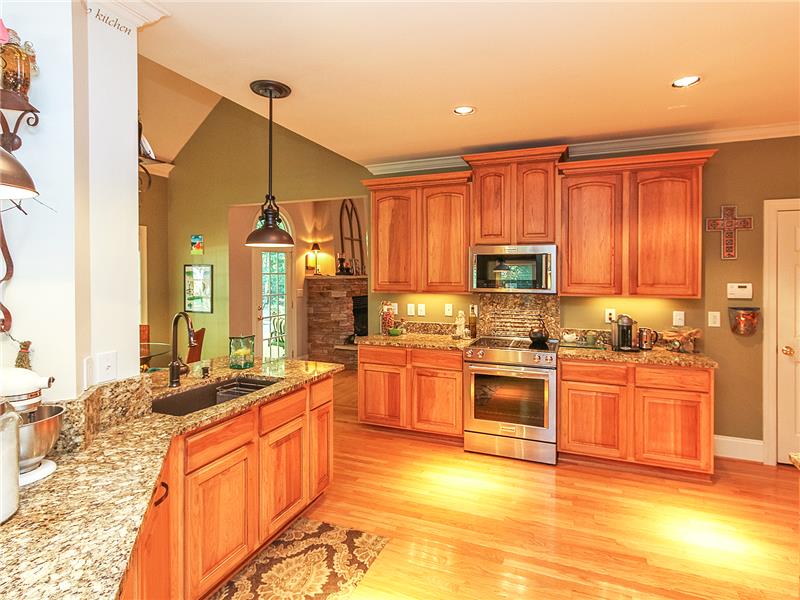 Hickory cabinetry, stainless appliances, granite countertops