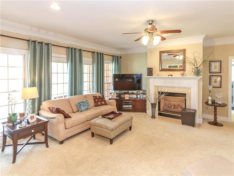 Gas log fireplace focal point of great room