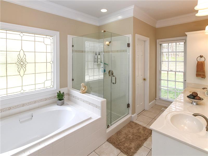 New frameless shower enclosure in master