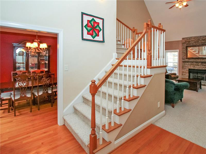 Stunning two-story foyer with turned staircase