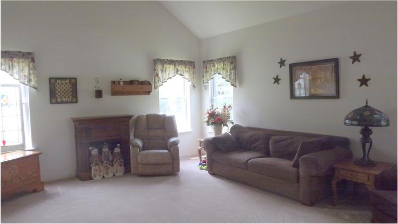 The family room features vaulted ceilings.