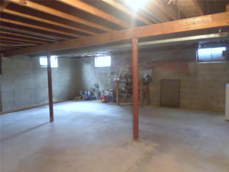 Basement where laundry hook ups are located.