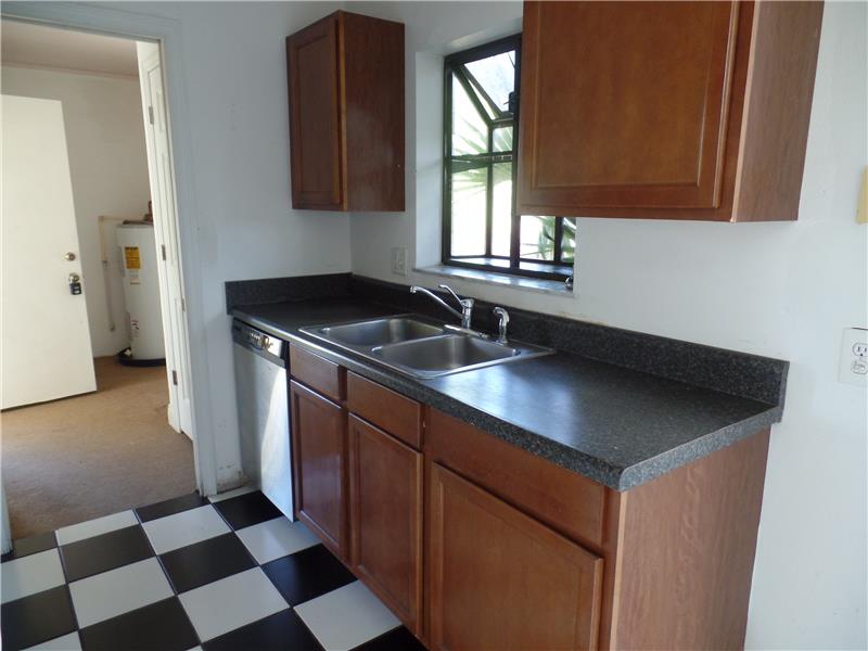Kitchen sink overlooks the backyard