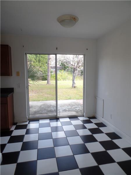 Sliders lead to large backyard