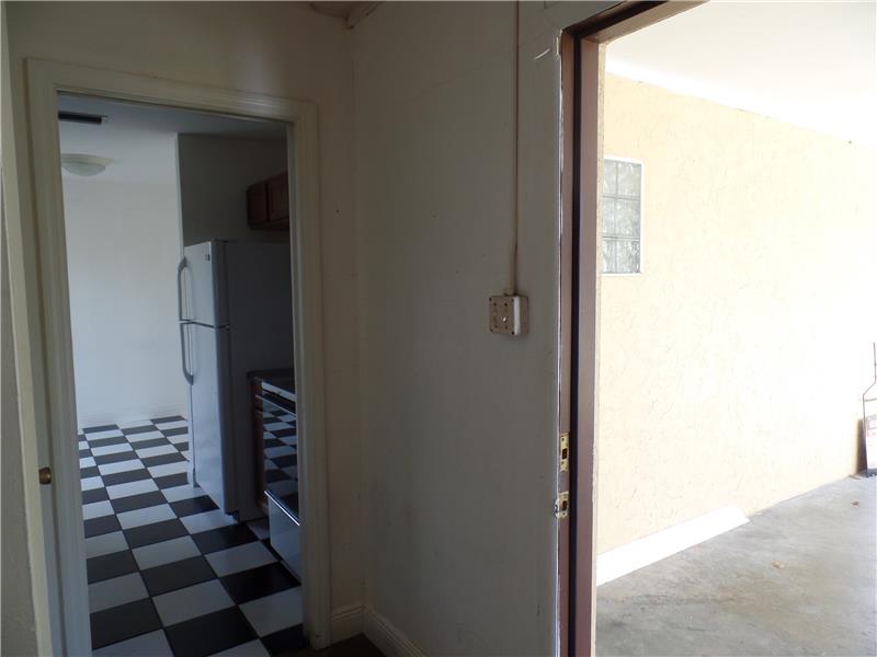 Laundry leads to Kitchen and Carport