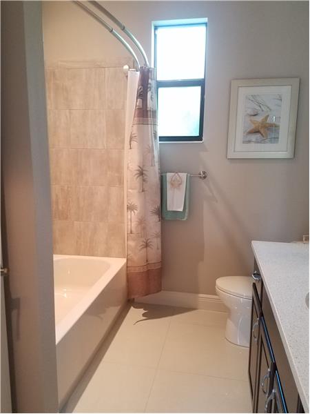 Guest Bath window opens letting in both natural light and fresh air.