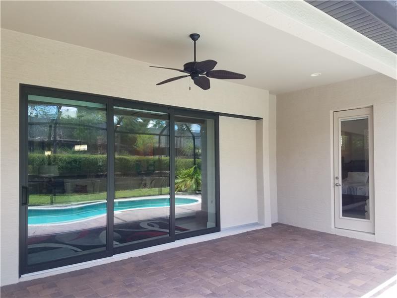 Covered dining/sitting area with ceiling fan