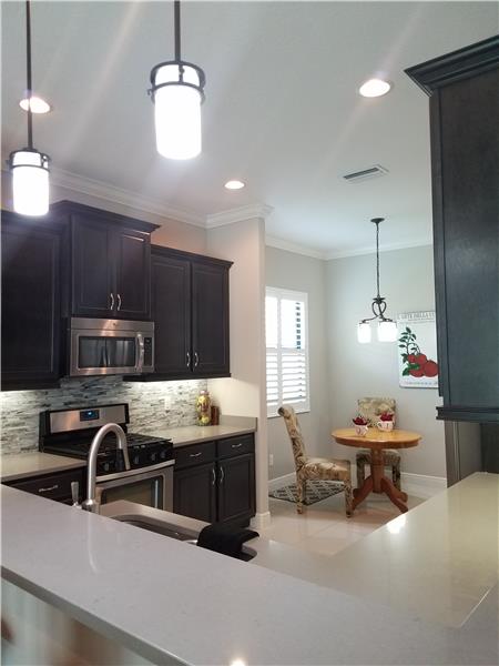 Designer lighting and breakfast bar