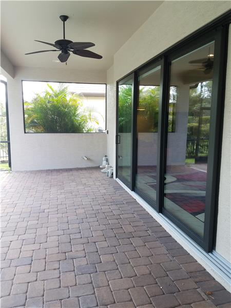 Designated area for a future outdoor kitchen with gas drop, electric outlet, and is pre-plumbed.