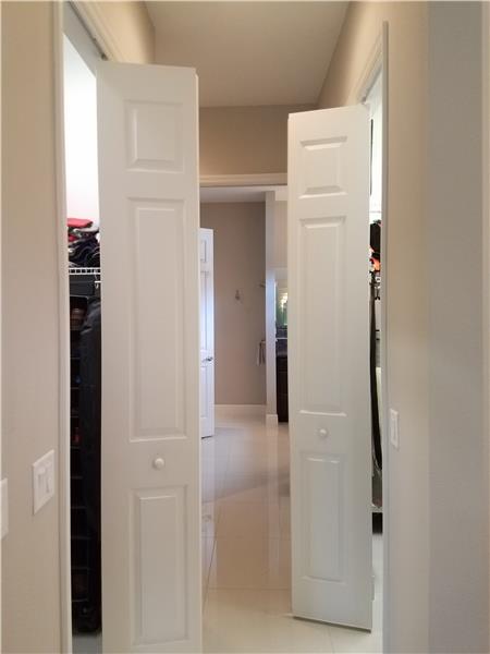 His and her’s tiled walk-in closets